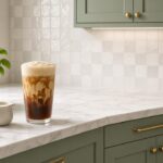 Root Beer Float-ish dirty soda: root beer with vanilla syrup, caramel syrup and cream over pebble ice.